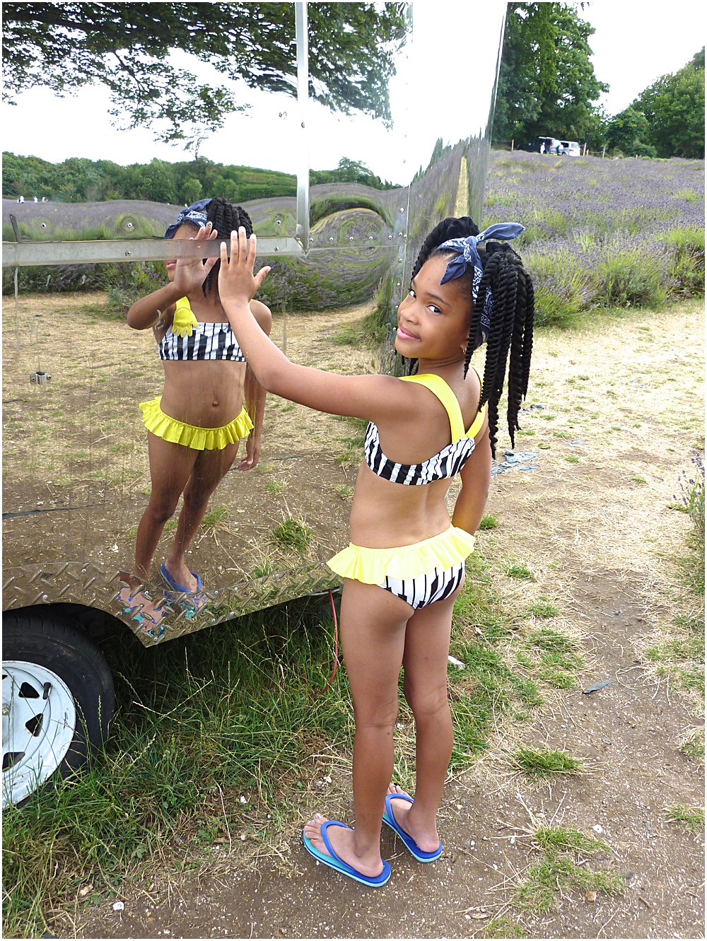Little black girl wearing Raspberry Plum SS18 Piano inspired bikini