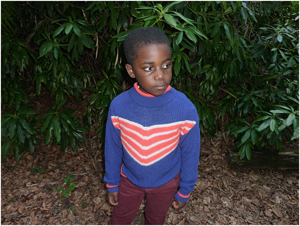 Little Black boy wearing the Indee Dalton sweatshirt