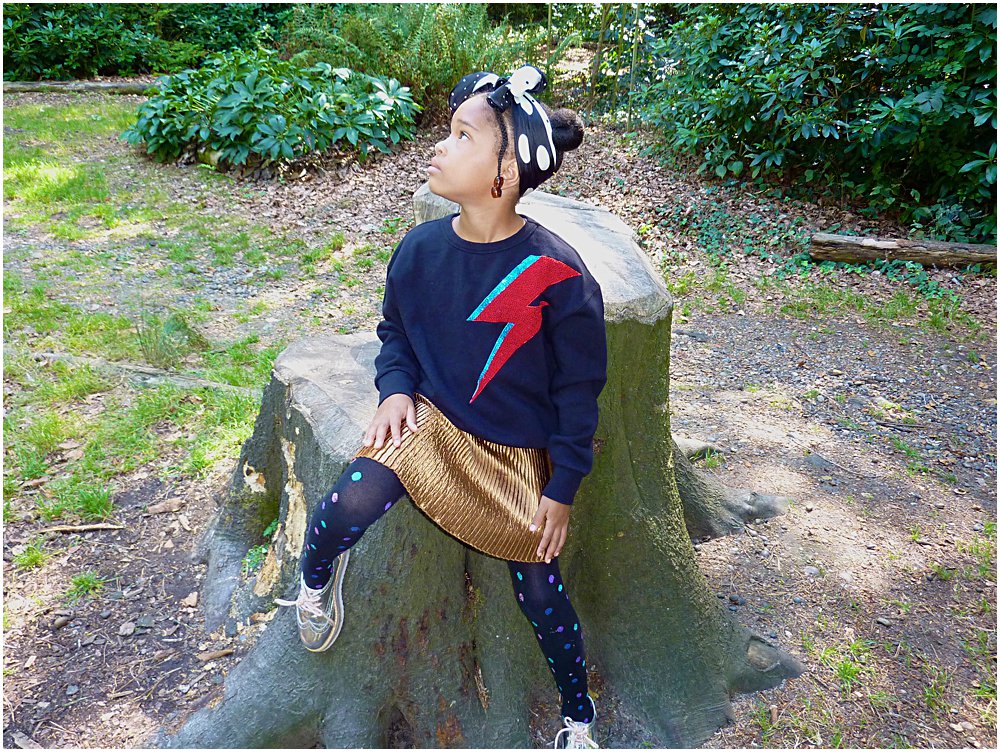 Little black girl wearing a statement jumper a trend for AW18